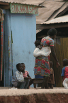 Woman Traditional Dress Carrying